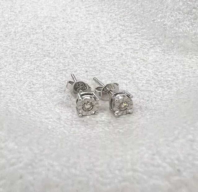 9Ct White Gold Diamond Accent Stud Earrings