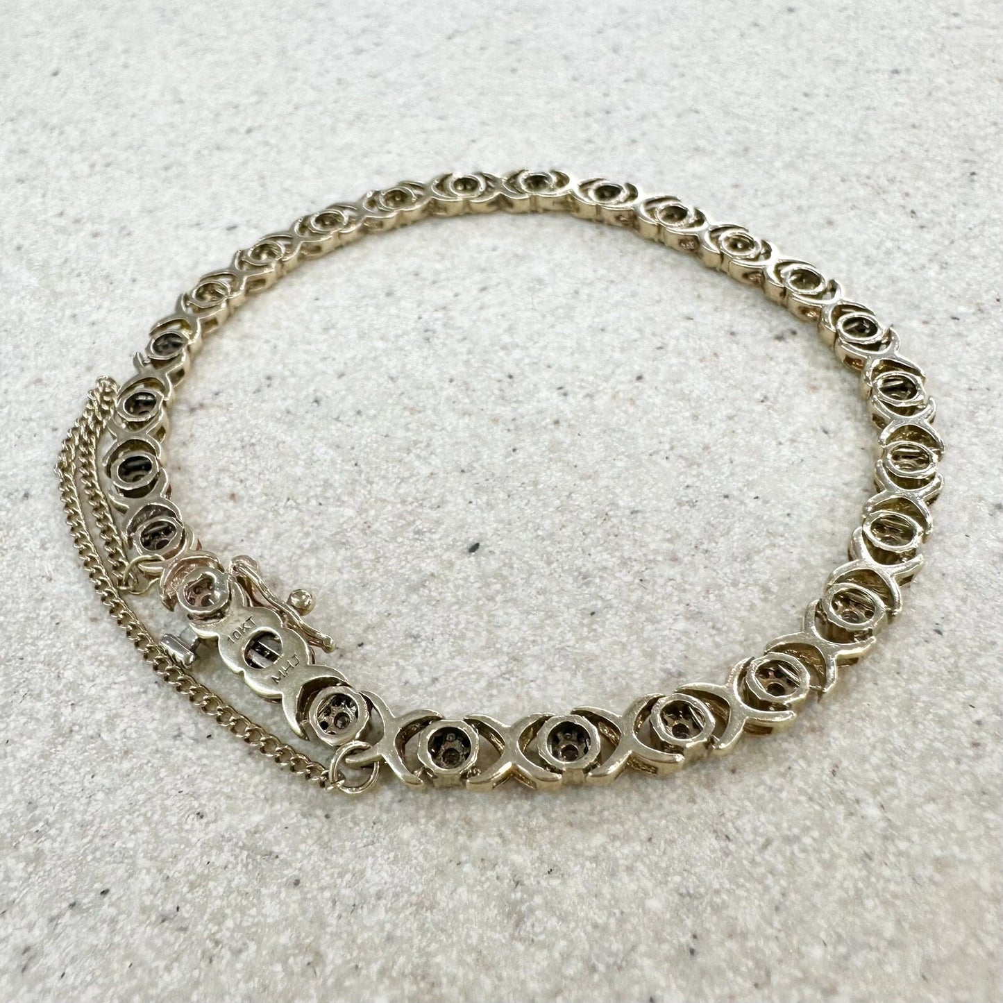 10Ct Yellow Gold .75 Carat TW Diamond 17cm X & O's Tennis Bracelet