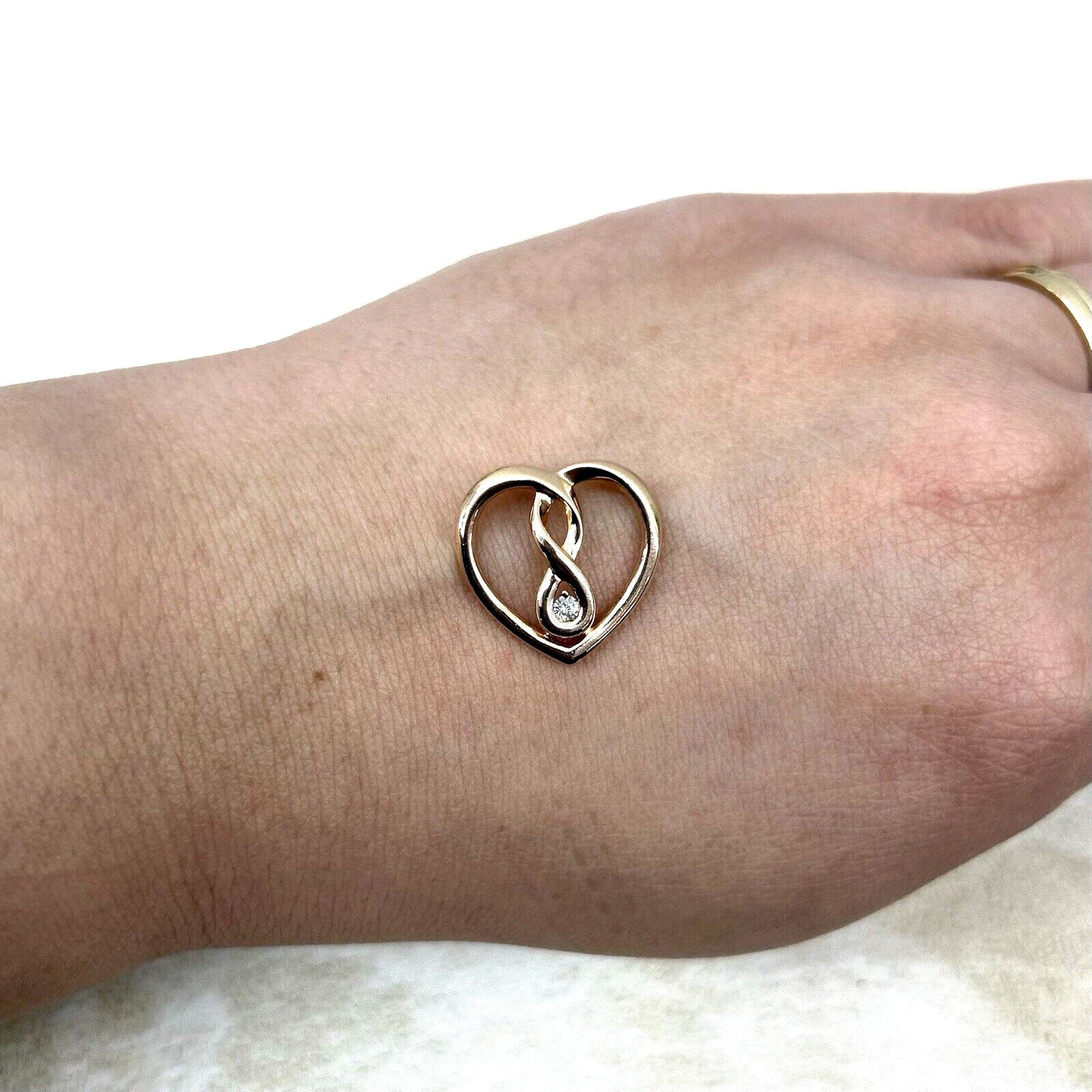 10Ct Yellow Gold 0.05 TW Diamond Set Infinity Heart Pendant