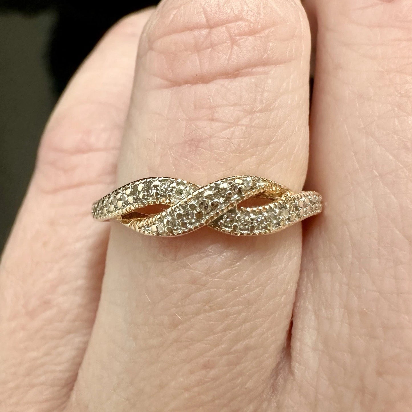 10Ct Rose Gold .10Ct TW Diamond Crossover Ring Sz K