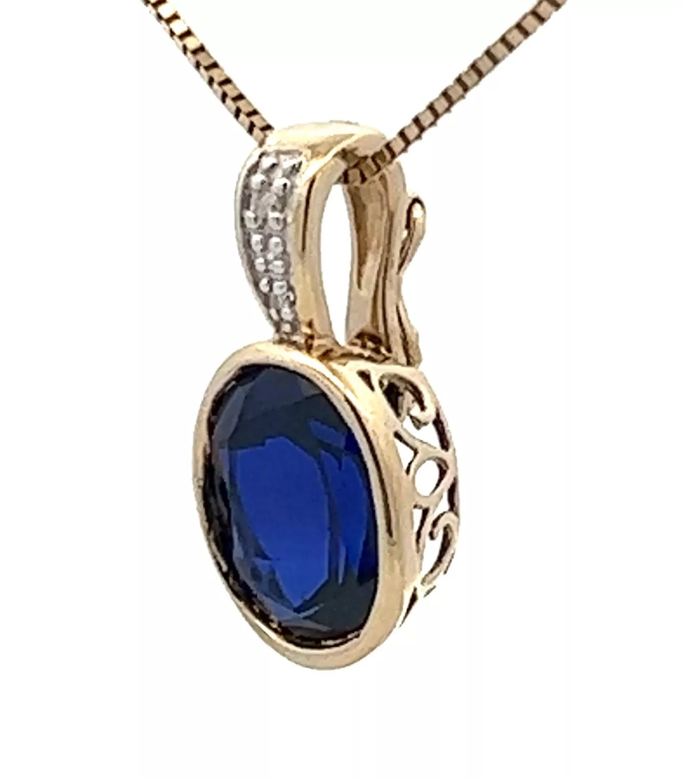 9Ct Yellow Gold & Created Blue Gemstone Pendant