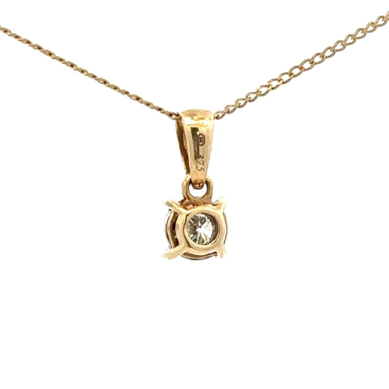 9Ct Yellow Gold .12 TW Diamond Illusion Set Pendant