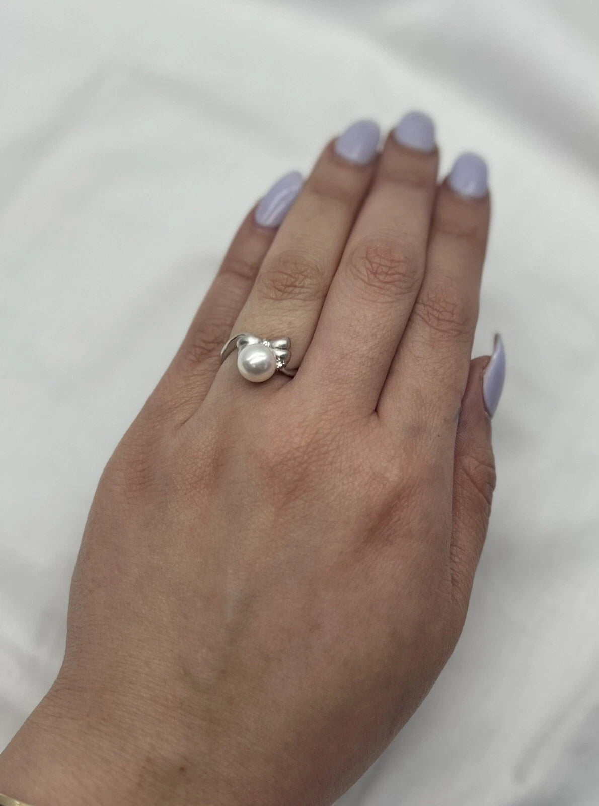 18Ct White Gold Diamond & Pearl Look Bow Ring