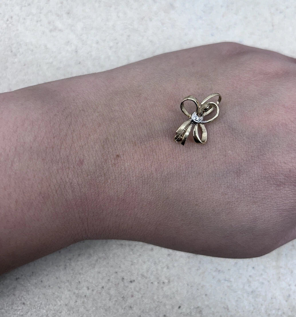 9Ct Yellow Gold Diamond Accent Bow Brooch