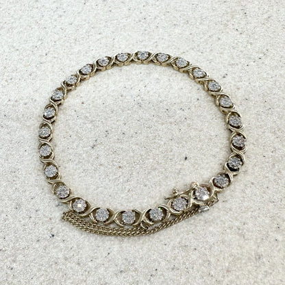 10Ct Yellow Gold .75 Carat TW Diamond 17cm X & O's Tennis Bracelet