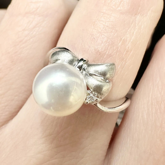 18Ct White Gold Diamond & Pearl Look Bow Ring