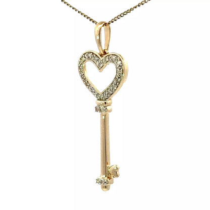 9Ct Yellow Gold .02 Carat TW Diamond Heart Key Charm Pendant