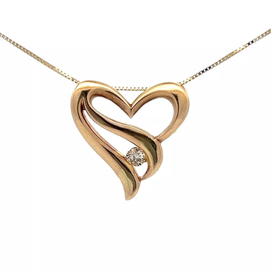 9Ct Yellow Gold 0.24 Carat TW Diamond Accent Heart Pendant