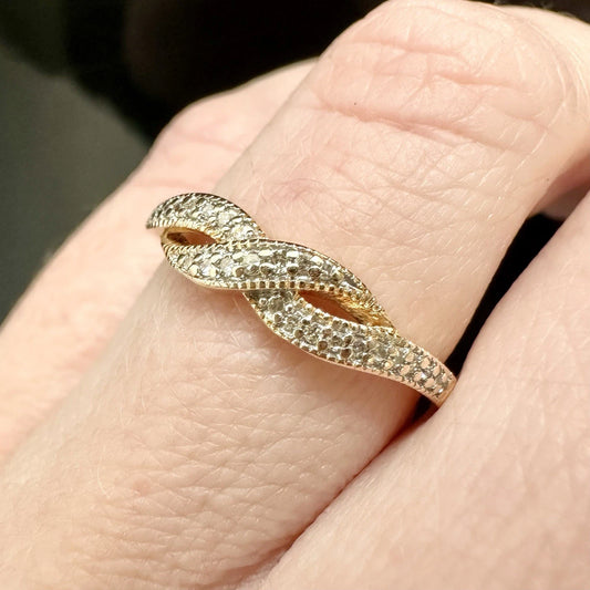 10Ct Rose Gold .10Ct TW Diamond Crossover Ring Sz K